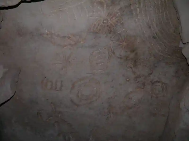 Solar disc and other solar symbols on a stone in the grave of Jeremiah